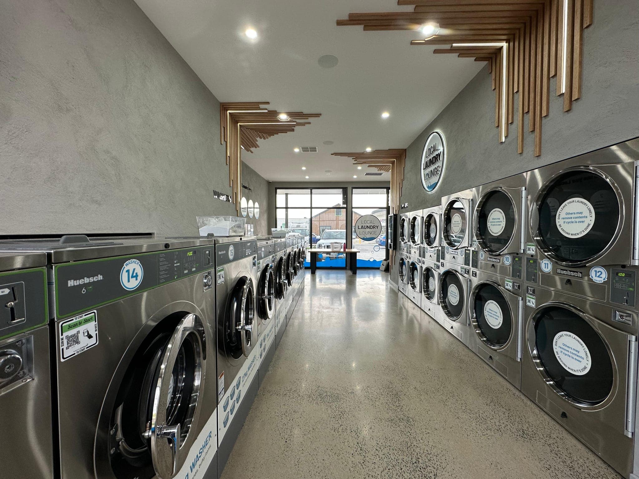 Washers and dryers inside Local Laundry Lounge Ashbury